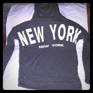 A hooded long sleeved shirt